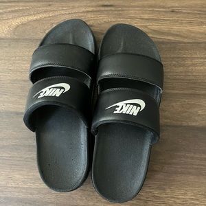 Gently used Nike slides size 9